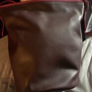 Coach Duffle. Dust bag and original tags included. Only worn once.